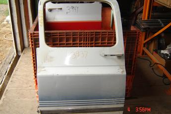 73 - 91 Chevrolet Suburban Left Side OEM Secondary Door.  Large dent in center, no glass, no rust.