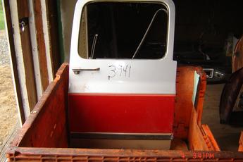 73 - 91 Chevrolet Suburban Right Side OEM Secondary Door.  Silver & red in color.