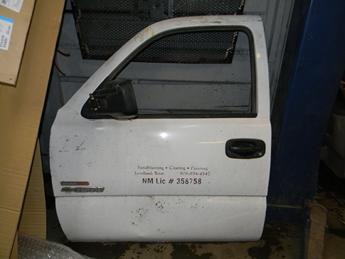 1999 2000 2001 2002 2003 2004 2005 2006 CHEVY DRIVERS DOOR, MANUAL WINDOW. BIG DENT IN THE MIDDLE OF THE DOOR. FRONT EDGE HAS MANY SMALL DINGS. RUST FREE. #14244